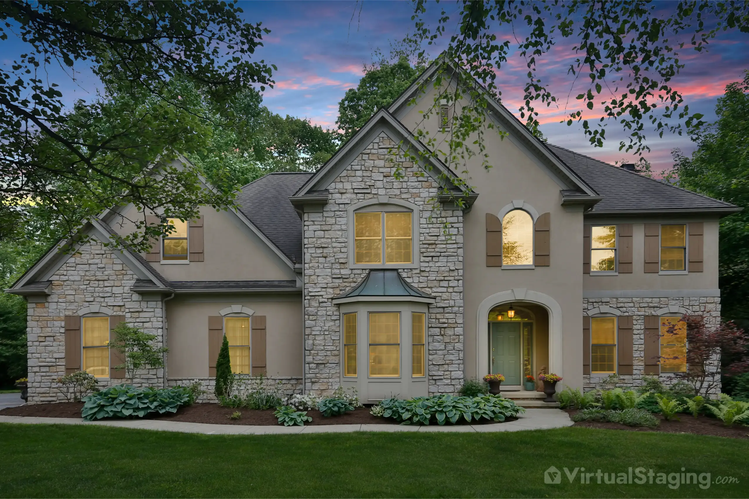 Real estate listing photo with virtual twilight effect, highlighting a well-lit home exterior against a picturesque evening sky.