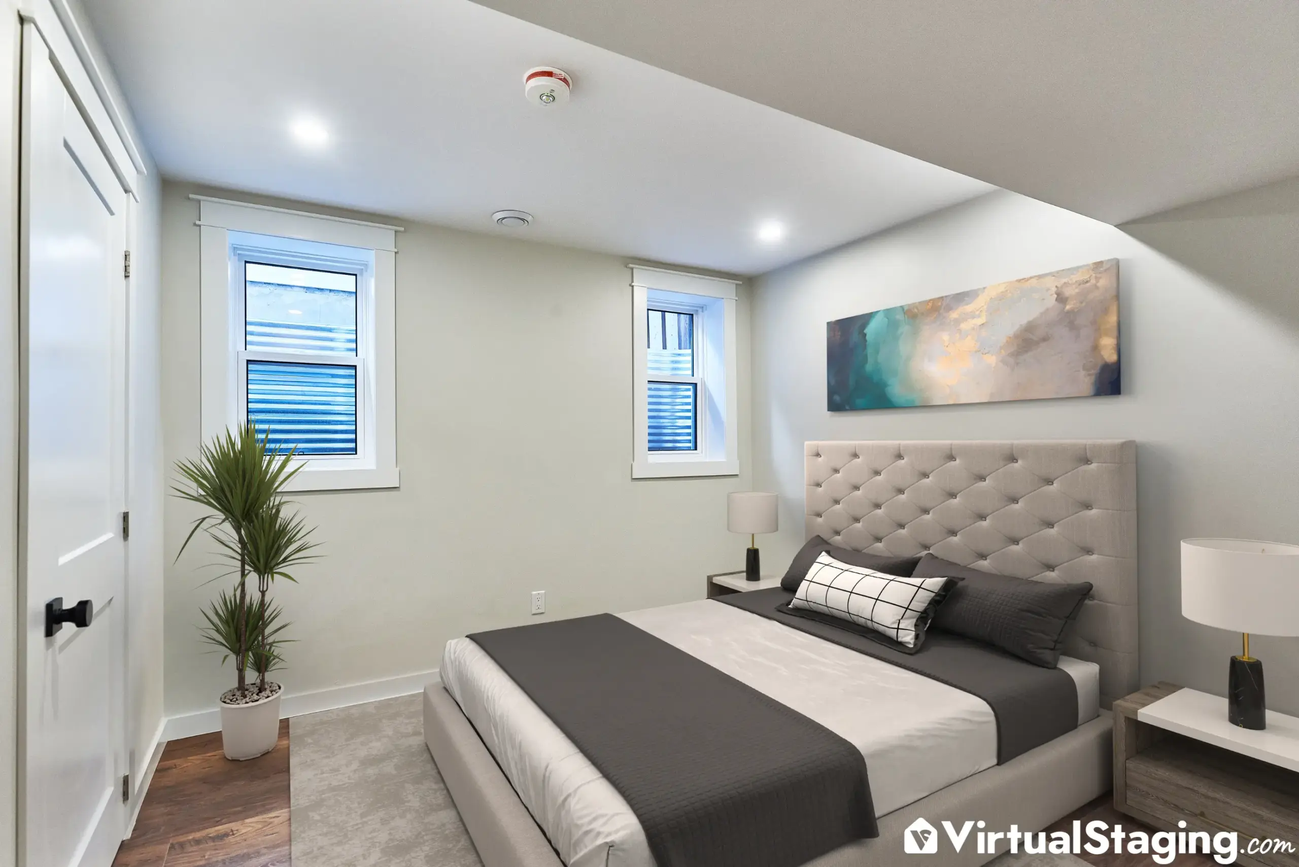 A primary bedroom that's been virtually staged